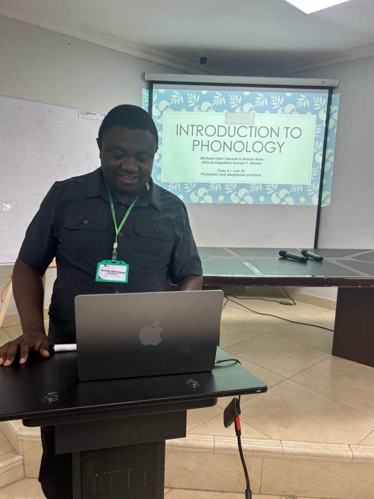 Prof. Michael Obiri-Yeboah giving a presentation at the ALS titled "Introduction to Phonology." 