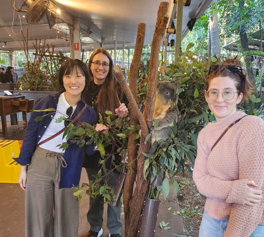 Dr. Hanwool Choe, Dr. Cynthia Gordon and Kylie Lance with a koala